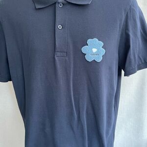 Men's Sandro Paris Blue Polo Shirt with Light Blue Flower Patch